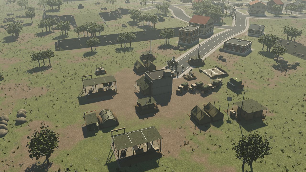 An OPFOR base of tents, earth-banked shelters and camouflage netting.